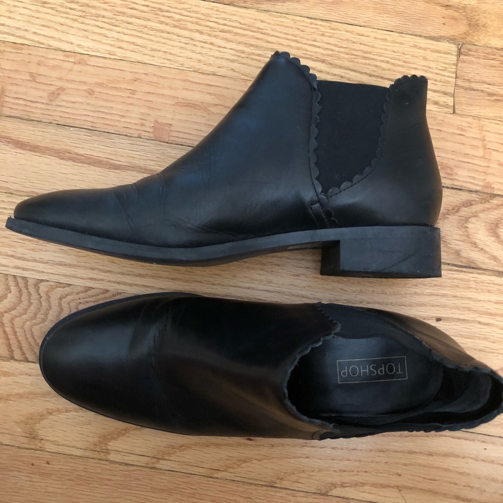 Black ankle boots by TopShop.